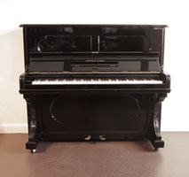 Antique, 1887, Steinway upright piano with a black case and indented front panels