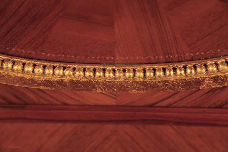Steinway gold beading detail