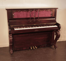 Piano for sale. Reconditioned, Victorian upright piano with a rosewood case and carved, cabriole legs. Piano has an eighty-eight note keyboard and three pedals.