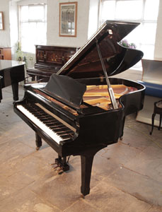 Reconditioned, 1970, Yamaha C3 grand piano for sale with a black case and spade legs