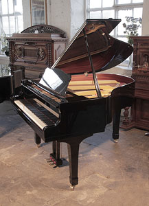 Reconditioned, 1987, Yamaha G1 baby grand piano for sale with a black case and square, tapered legs Piano has an eighty-eight note keyboard and a two-pedal lyre.