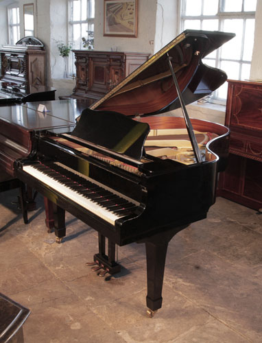 Reconditioned,   1987, Yamaha G2 grand piano for sale with a black case and spade legs 