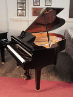 Reconditioned, 2019, Yamaha GB1 baby grand piano for sale with a black case and square, tapered legs. Piano has an eighty-eight note keyboard and a three-pedal lyre.