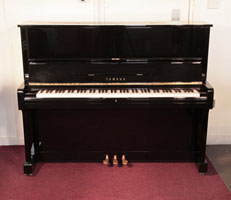 Reconditioned, 1974, Yamaha U1 upright piano with a black case and polyester finish