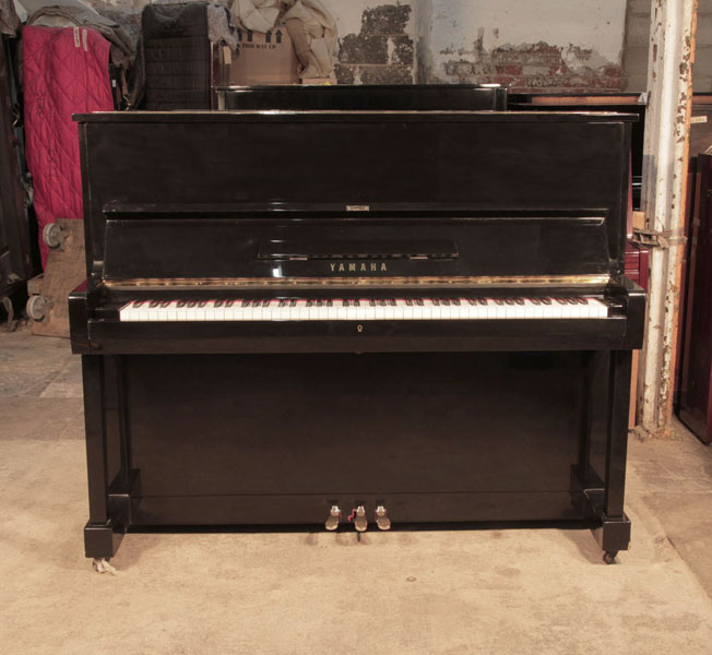 Reconditioned, 1994, Yamaha U1 upright piano with a black case and polyester finish 