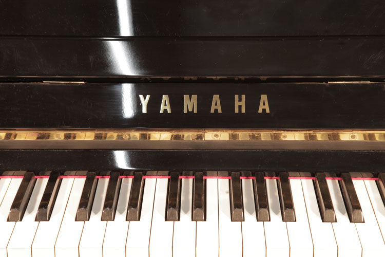 Yamaha U1 manufacturers logo on fall.