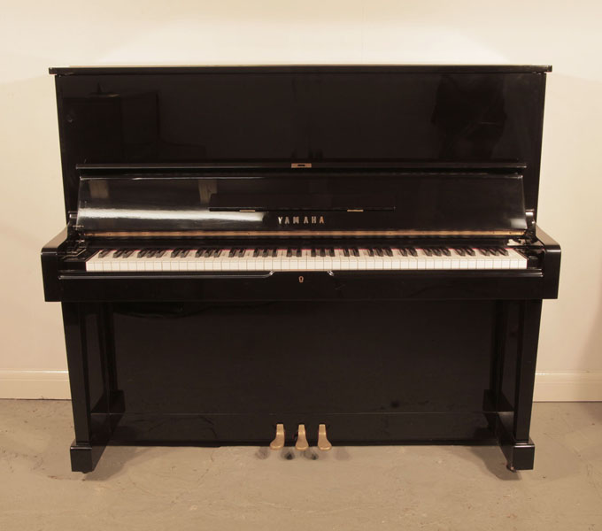 Reconditioned, 1965, Yamaha U2 upright piano with a black case and polyester finish 