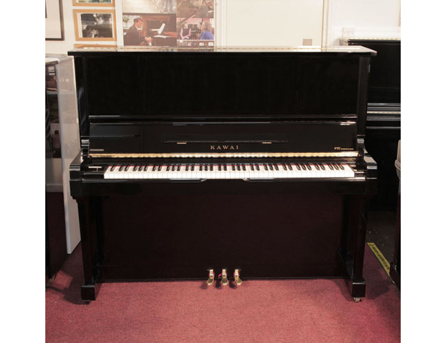 Reconditioned, 2004, Kawai VT-132 Upright Piano For Sale with a Black Case and Brass Fittings. Piano has a variable keyweight touch control lever. Piano has an eighty-eight note keyboard and three pedals. 
