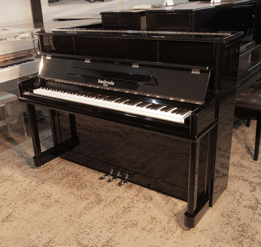 As new, 2020, Besbrode SU112 upright piano for sale with a black gloss case and chrome fittings