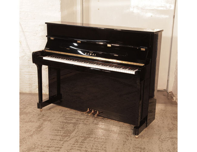 As new, Kawai K-2 upright piano for sale with a black gloss case