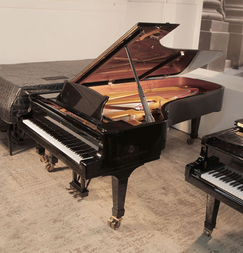 Reconditioned,  1995, Steinway Model D concert grand piano with a black gloss case. Piano has an eighty-eight note keyboard and a three-pedal lyre.
