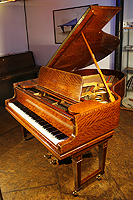 Steinway Model O grand piano with a polished, satinwood case. Delicately inaid with boxwood stringing and crossbanding