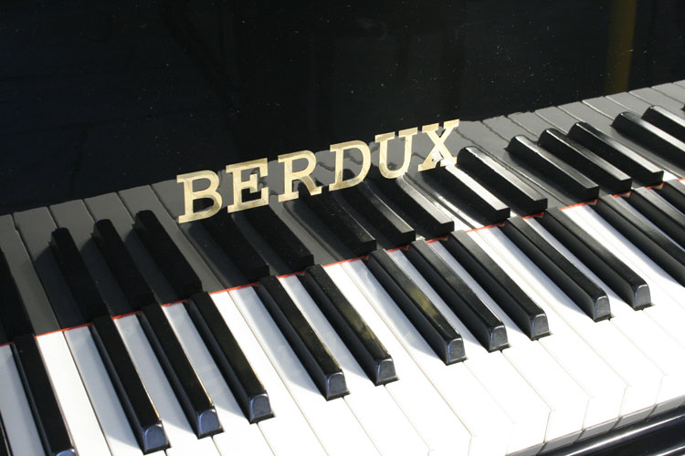 Berdux  Piano manufacturer's logo on fall