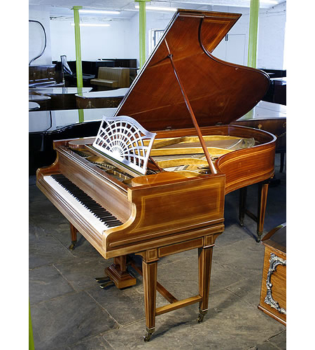 An 1884, Bechstein Model B grand piano for sale with a mahogany case and gate legs, inlaid with satinwood stringing