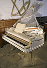 Piano for sale. A brand new Steinhoven  grand piano with a transparent, acrylic case.
