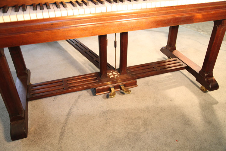 Lipp square, gate legs and two-pedal piano lyre attached to a slatted cross stretcher