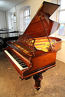 A restored, 1908, Bechstein Model B Grand Piano For Sale with a Rosewood Case, Cut Out Music Desk in a Sunset Design and Turned Legs.