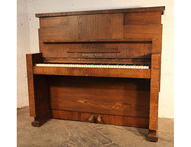 Restored, 1926, Gerhard Adams upright piano with a Modernist almost Brutalist style, oak case.