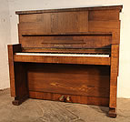 Piano for sale. A Gerhard Adam upright piano with a Modernist almost Brutalist style oak case