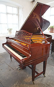 Bechstein Model B grand piano with a mahogany case.