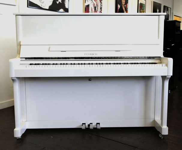 Brand New, Feurich Model 122 upright Piano for sale with a white case.