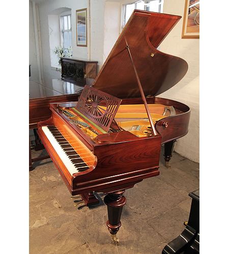 Restored, Bechstein Model A grand piano with a polished, rosewood case and turned faceted legs. Piano has an eighty-five note keyboard and a two-pedal lyre. 