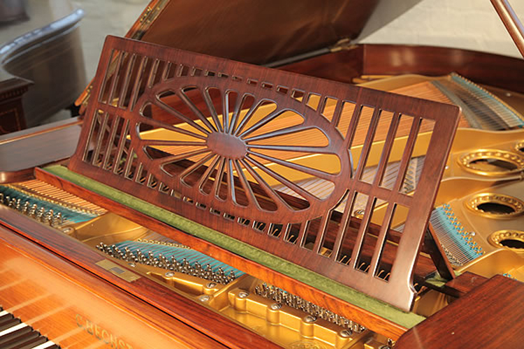 Bechstein piano music desk in an openwork slatted design with central sunburst motif