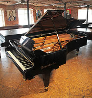 A 1971, Bosendorfer Model 290 Imperial grand piano with a polished, black case