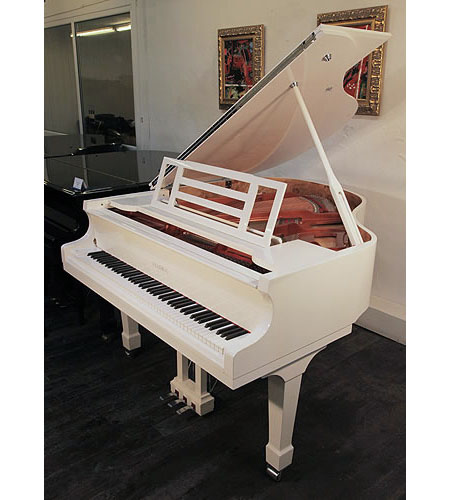 Brand new, Feurich Model 161 Professional grand piano with a white case and chrome fittings. 