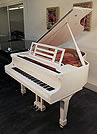 Piano for sale. A  Feurich Model 161 Professional grand piano with a white case and chrome fittings