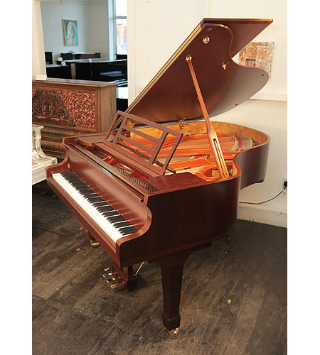 Brand new, Feurich Model 178 Professional grand piano with a satin, walnut case and fitted iQ Pianodisc player system. Piano has a three-pedal lyre and an eighty-eight note keyboard.  