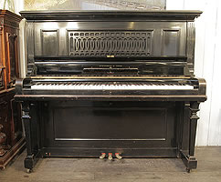 A rare, 1918, Steinway Model R upright grand piano with a black case and cut-out front panel