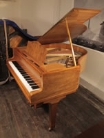 A Bluthner Baby Grand Piano For Sale with a Walnut Case and Spade Legs