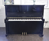 Piano for sale. A 1991, Kawai SU-2L upright piano with a black case and polyester finish