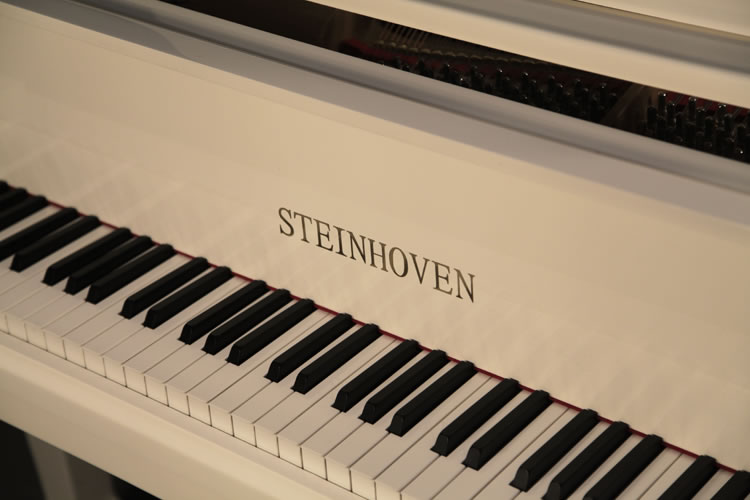 White Steinhoven  Model 148  Baby Grand Piano for sale. We are looking for Steinway pianos any age or condition.