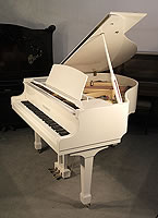 Nearly New, Steinhoven Model 148 Baby Grand Piano For Sale with a White Case and Spade Legs