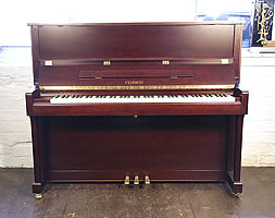 A Brand new, Feurich Model 122 upright piano with a satin, mahogany case and brass fittings
