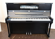 Piano for sale. Brand New, Feurich Model 123 Upright Piano For Sale with a Satin, Black Case, LED Lighting and Chrome Fittings. Piano features a high speed KAMM action that allows for extremely fast repetition