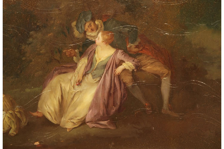 Detail of an amourous couple reclining outdoors