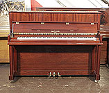 Piano for sale. A brand new, Besbrode SU112 upright piano with a mahogany case and polyester finish