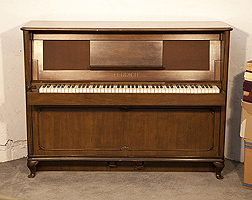 Artcased, 1937, Feurich ship upright piano with a walnut case, folding keyboard and wickerwork front panel
