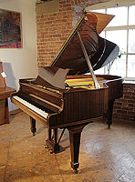 A 1975, Steinway Model O grand piano for sale with a mahogany case and spade legs