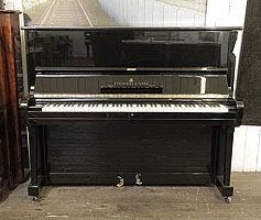 Reconditioned, 1961, Steinway Model V upright piano with a black case and brass fittings.