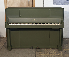 A 1945, Steinway 'Victory Vertical' G.I. upright piano for sale with a khaki case. This upright was airdropped onto battlefields during WWII for the American troops