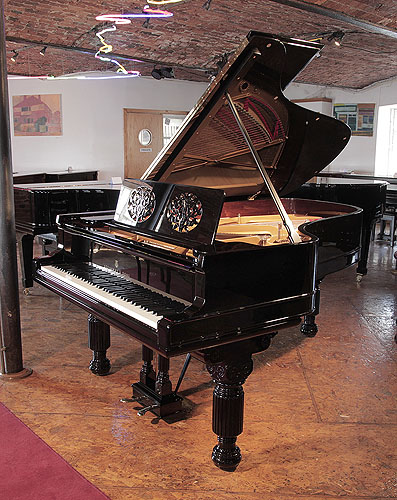 Restored, 1881, Steinway Model B grand piano with a black case,  music desk in a foliar cut-out design and elephant legs