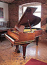 Piano for sale. A 1906, Steinway Model O grand piano for sale with a mahogany case and spade legs. Piano has an eighty-eight note keyboard and a two-pedal lyre