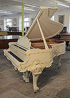 A 1979, Louis XV style, Steinway Model O grand piano for sale with an off-white case and ornately carved, cabriole legs. Entire cabinet features Rococo style, carvings accented with gilt detail. Piano comes with a matching piano stool