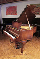 A 1954, Steinway Model S baby grand piano for sale with a polished, mahogany case and cabriole legs