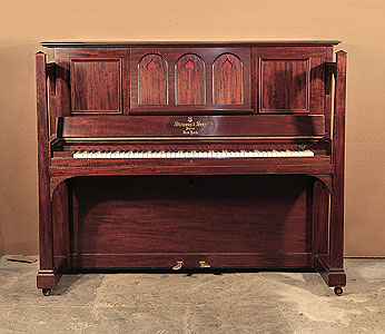  Arts and Crafts style, 1905, Steinway upright piano for sale with a figured, mahogany case and large sculptural legs. Cabinet features a music desk in a three arch design with cut-out inverted hearts backed with red felt.