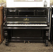 Antique, 1889, Steinway upright piano with a black case and square, tapred legs